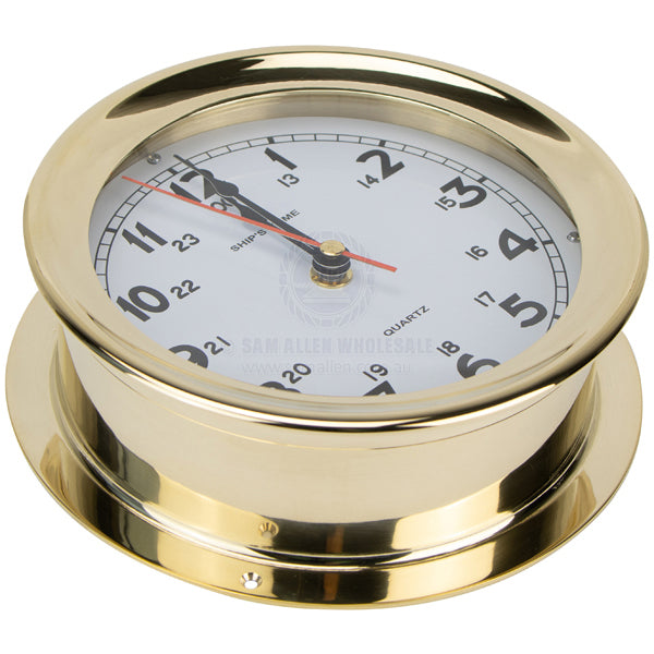 Clock polished brass 135mm diam white face 180mm diam base